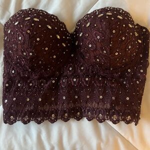 Very flattering bustier top! Only worn twice